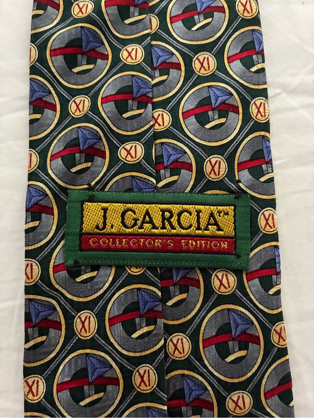 J. Garcia Green Geometric Medallion Silk Tie with Blue and Red Accents